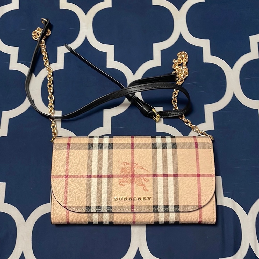 This is a Burberry purse and it is brand new purse.